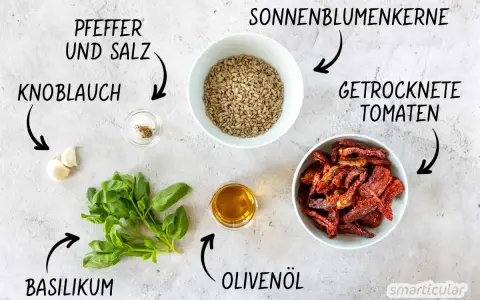 Zutaten für Pesto Rosso: Basilikum, Knoblauch, Sonnenblumenkerne, getrocknete Tomaten, Olivenöl, Pfeffer und Salz.